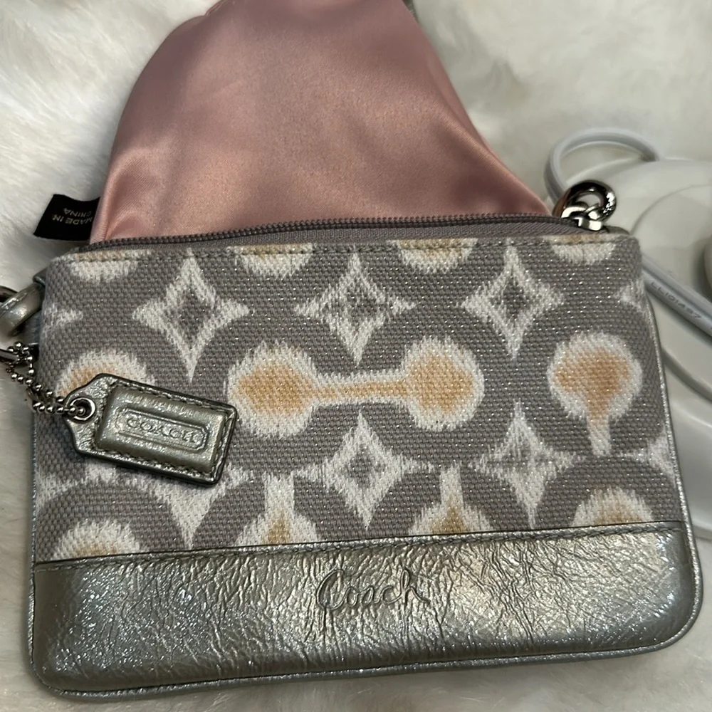 Coach, gray and pink cloth leather wristlet